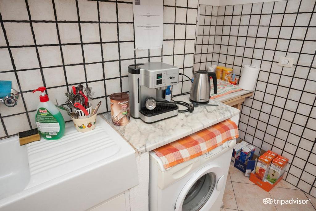 Kuchyň nebo kuchyňský kout v ubytování Solemare Accommodation Alghero