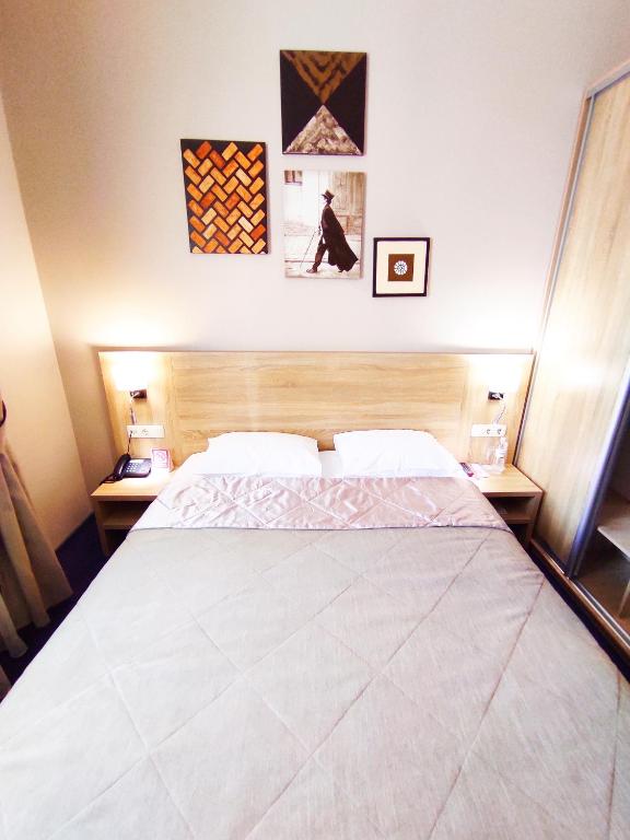 Postel nebo postele na pokoji v ubytování Mackintosh Hotel