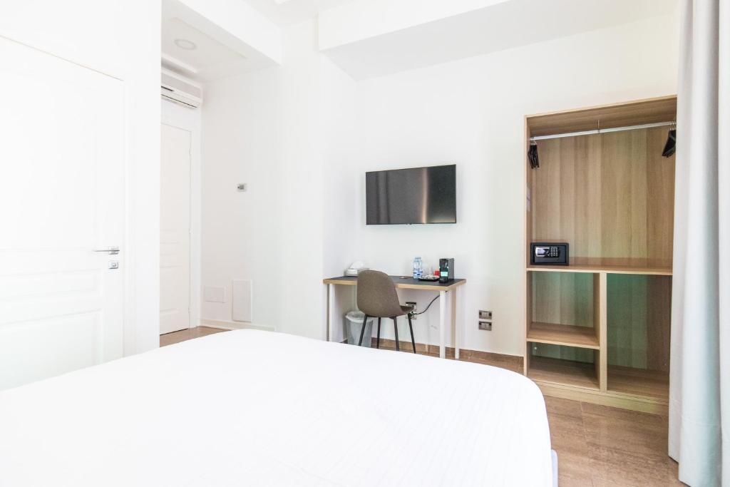 Postel nebo postele na pokoji v ubytování Sanfelice 33 Luxury Suites