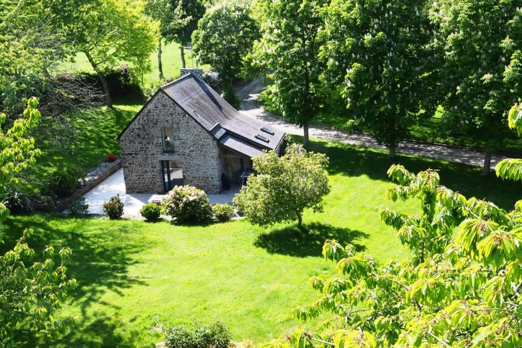an aerial view of a stone house in a field at Les Hirondelles in Baguer-Pican