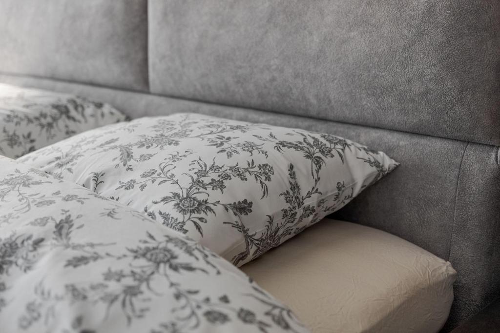 Posteľ alebo postele v izbe v ubytovaní Apartman DOWNTOWN DL