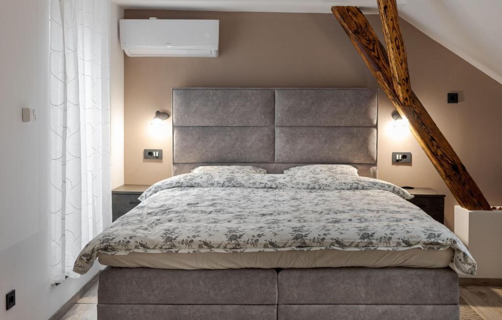Posteľ alebo postele v izbe v ubytovaní Apartman DOWNTOWN DL