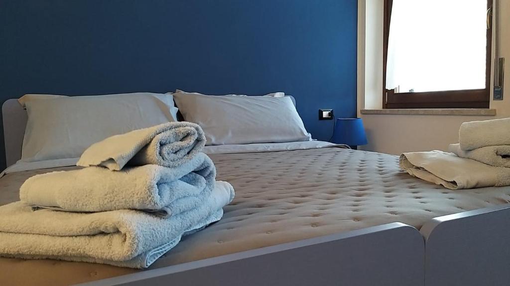 Postel nebo postele na pokoji v ubytování Casa Verde Belluno