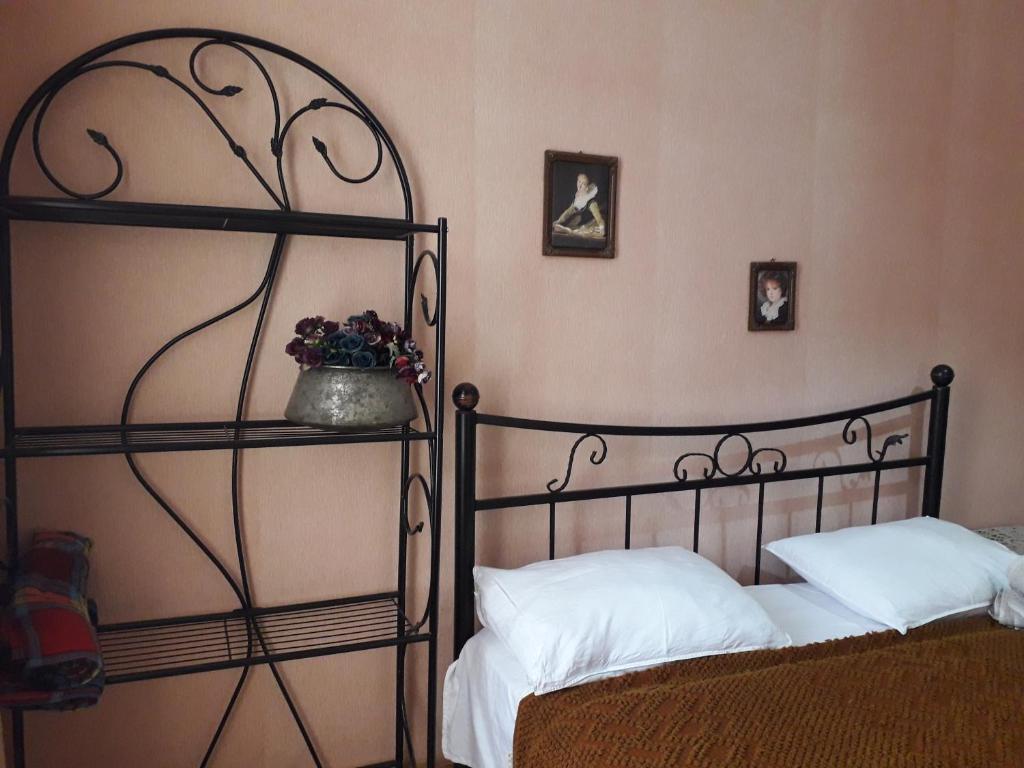 Postel nebo postele na pokoji v ubytování Nana's Guest House