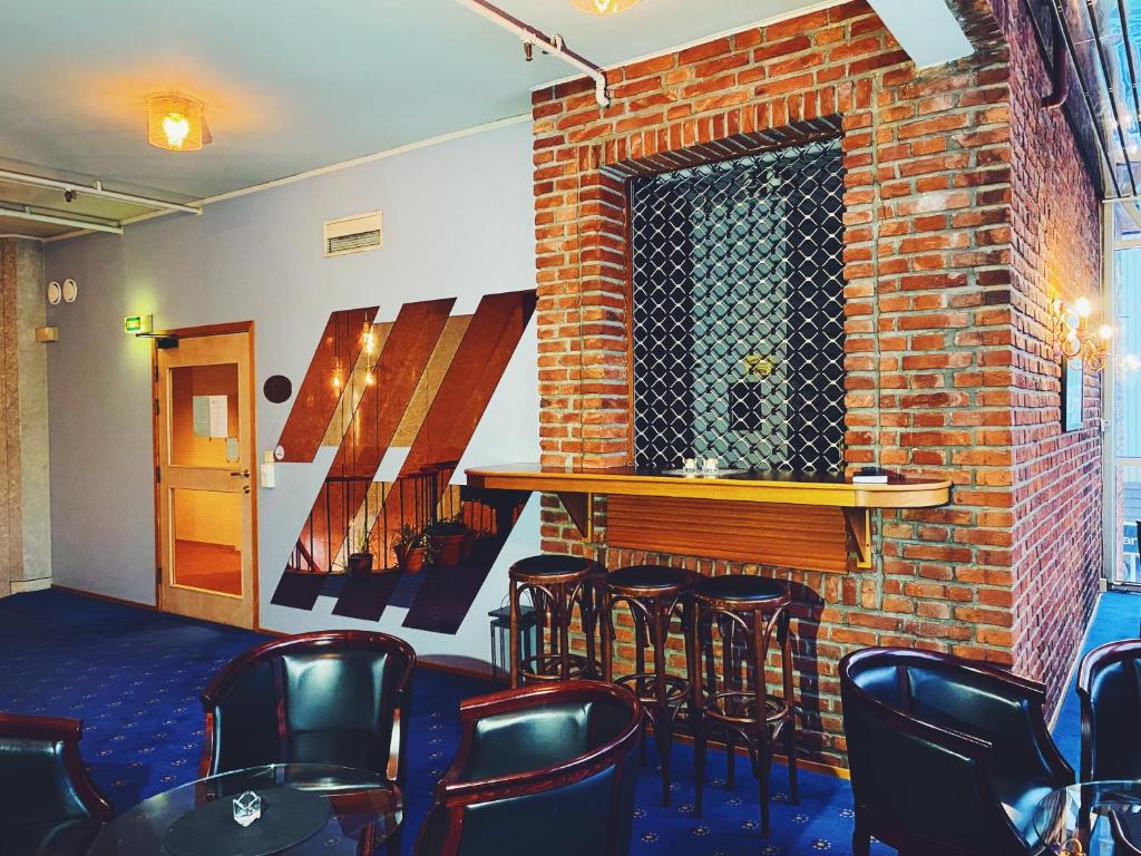 Posezení v ubytování Mitt hotell & apartments
