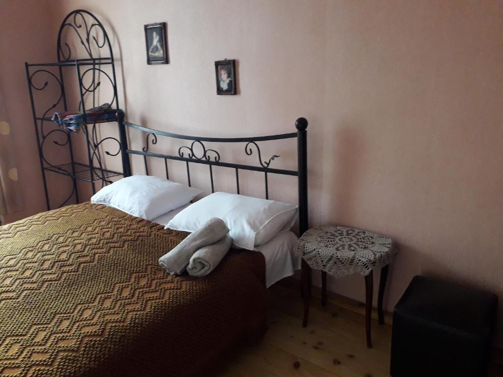 Postel nebo postele na pokoji v ubytování Nana's Guest House