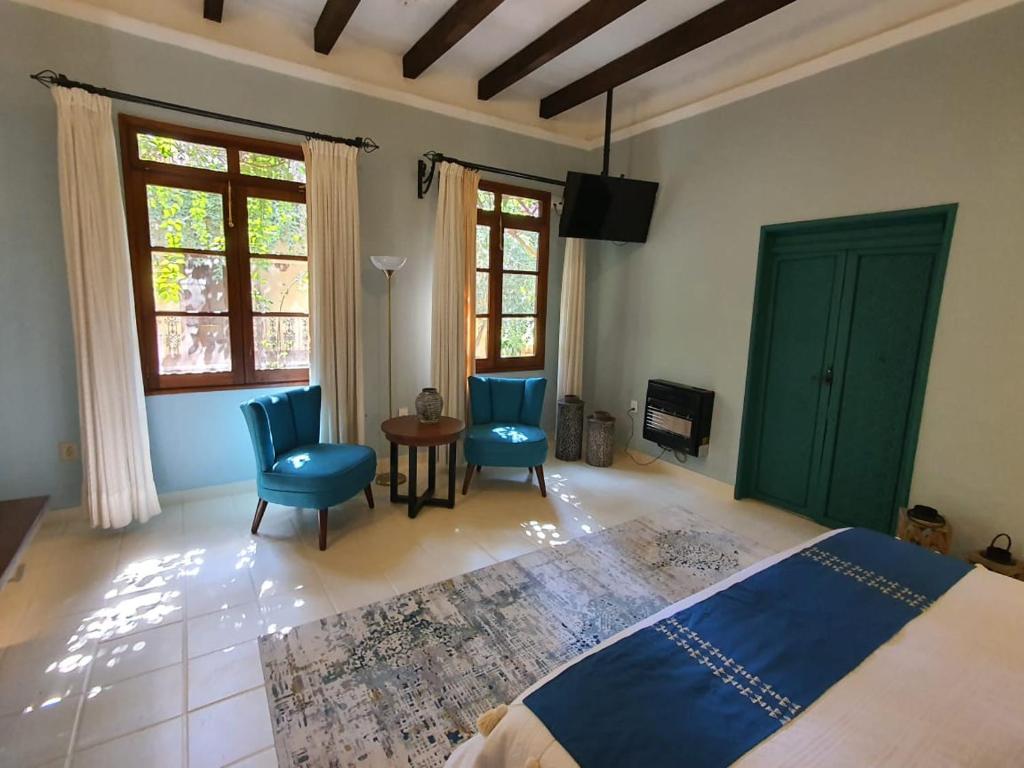 Postel nebo postele na pokoji v ubytování Mansion San Miguel