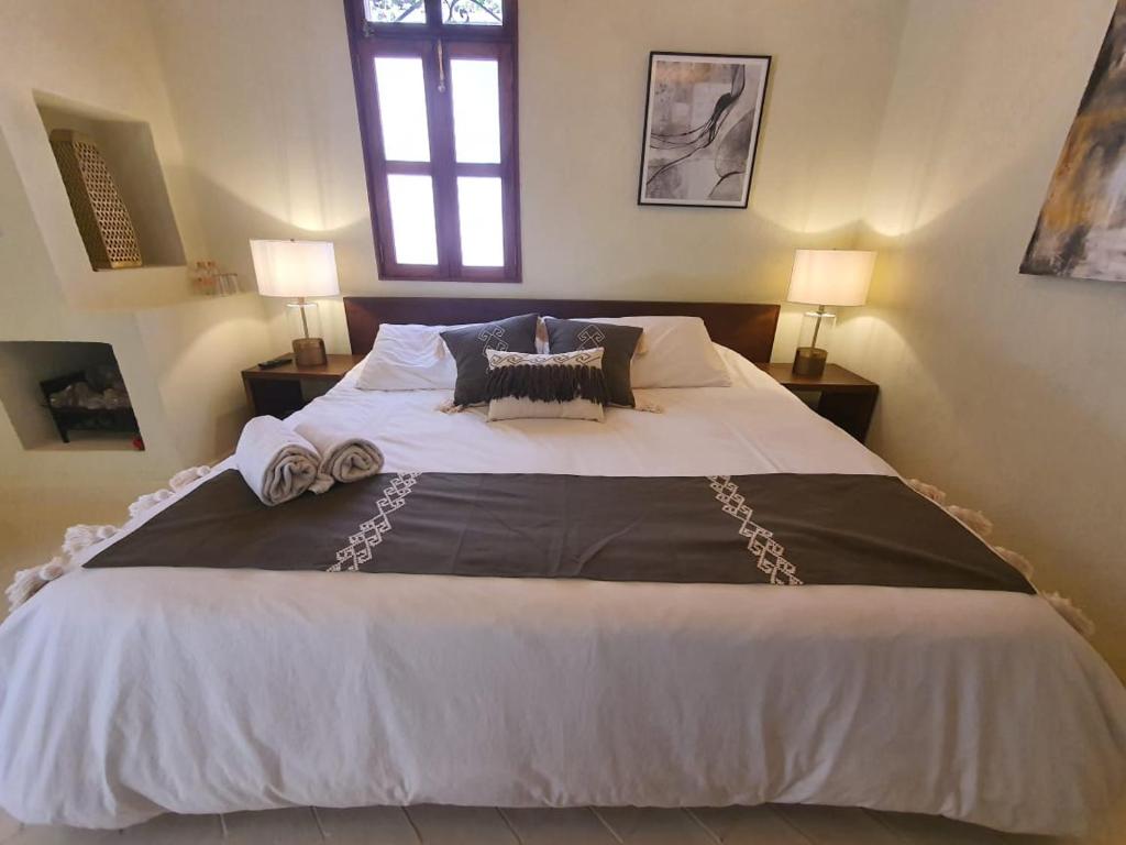 Postel nebo postele na pokoji v ubytování Mansion San Miguel