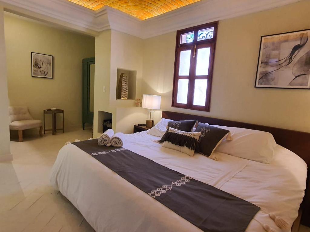 Postel nebo postele na pokoji v ubytování Mansion San Miguel
