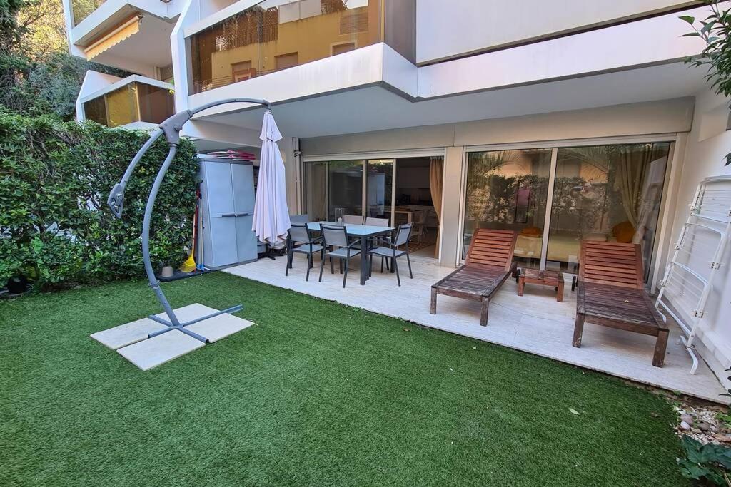 Zahrada ubytování Le Lodge, T2 classé 3 étoiles avec jardin, parking, piscine & mer à 2 pas