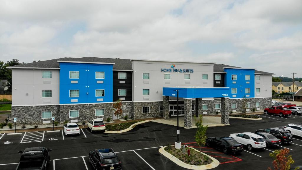 an aerial view of a hotel with a parking lot at Home Inn and Suites Olive Branch in Olive Branch