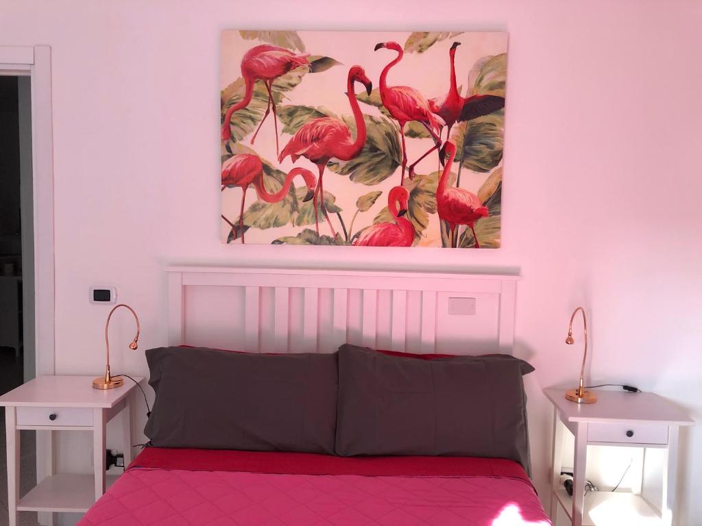 Postel nebo postele na pokoji v ubytování Hibiscus