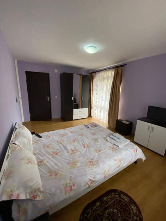 Postel nebo postele na pokoji v ubytování Casa Cristalina&Dumi