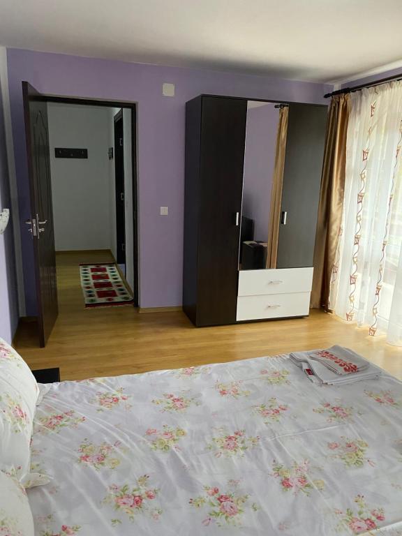 Postel nebo postele na pokoji v ubytování Casa Cristalina&Dumi