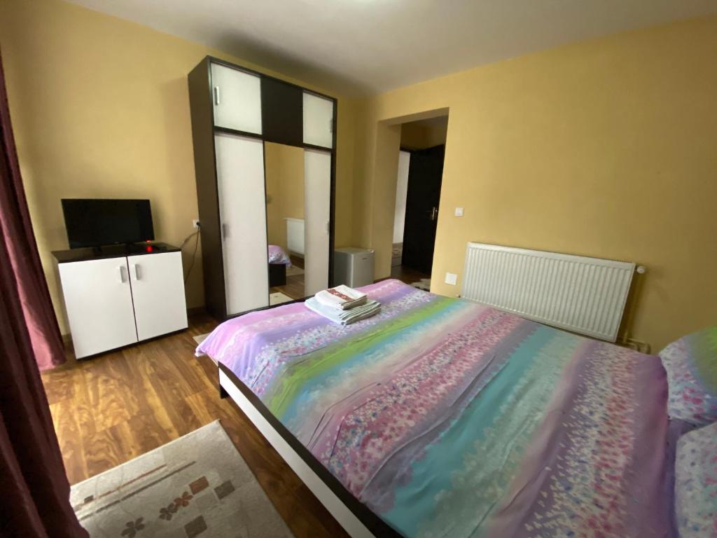 Postel nebo postele na pokoji v ubytování Casa Cristalina&Dumi
