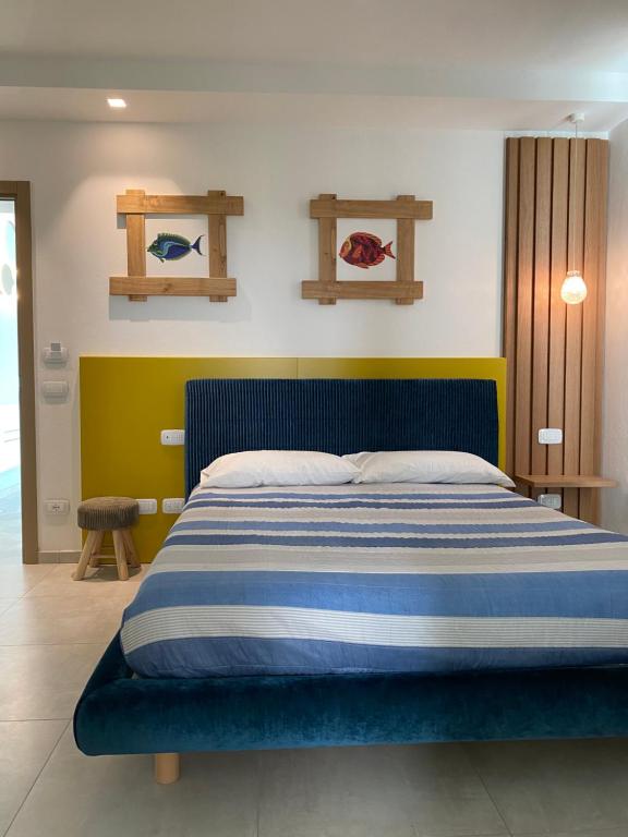 Postel nebo postele na pokoji v ubytování Mare e marmellata