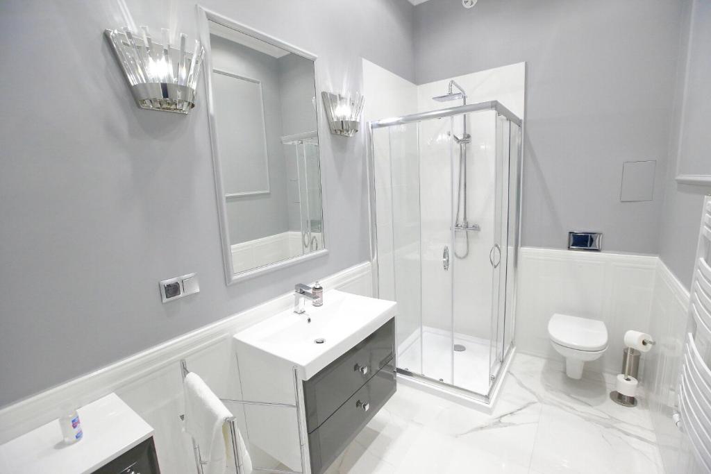 Kúpeľňa v ubytovaní Apartament Kryształowy AC Progres