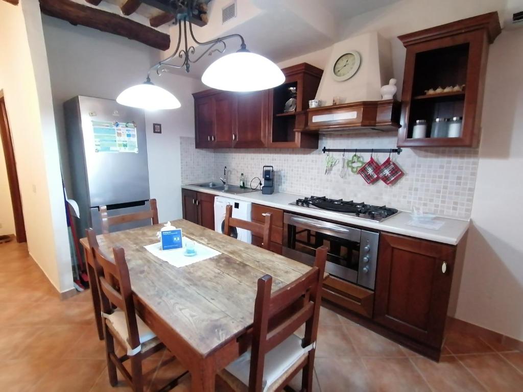 Kuchyň nebo kuchyňský kout v ubytování calloni franceschini home
