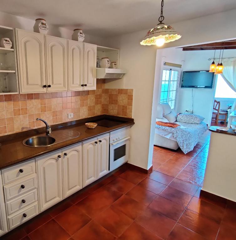 Kuchyň nebo kuchyňský kout v ubytování Apartamento Casa de Valentina