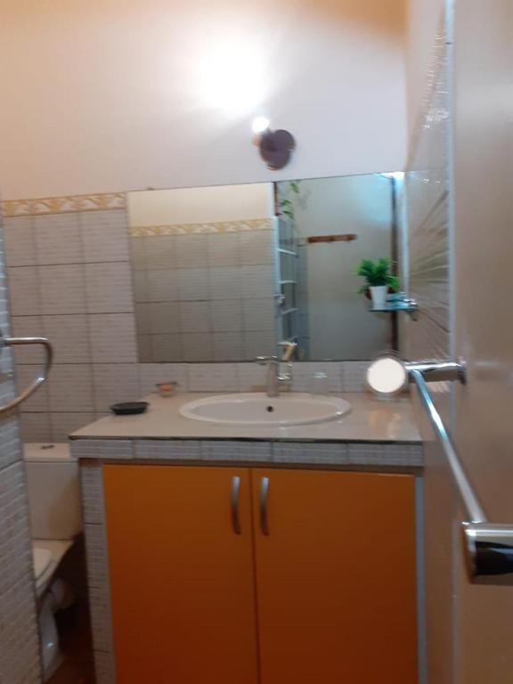 Koupelna v ubytování RESIDENCE LA TAUPINE MANDARINE