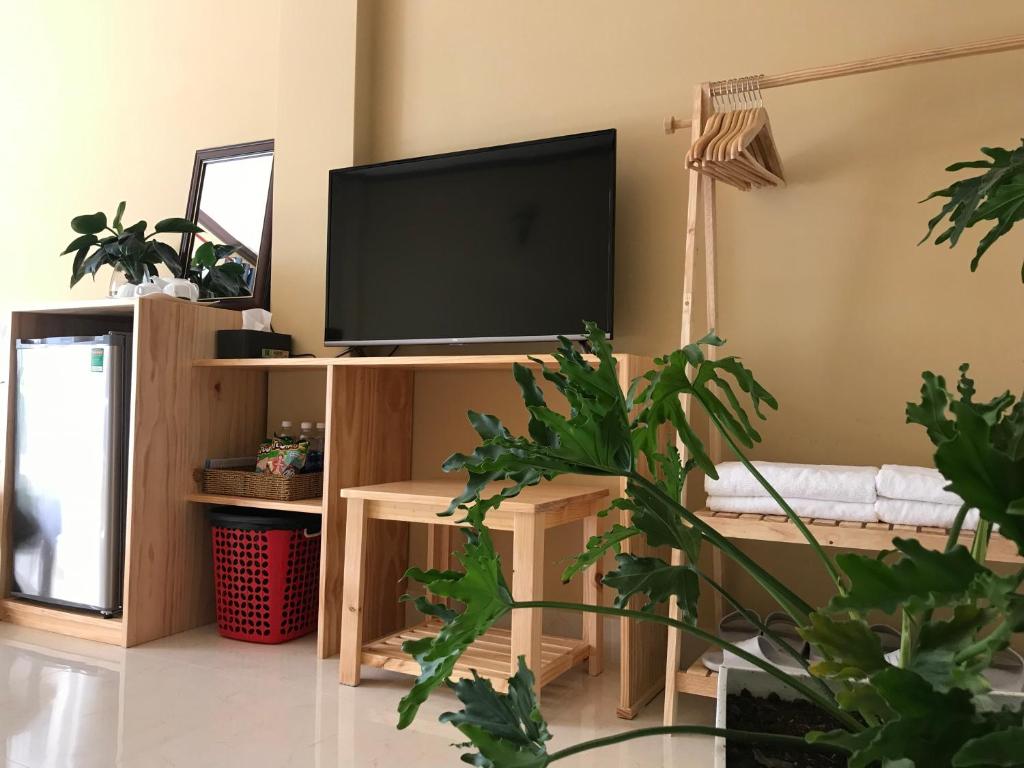 TV/trung tâm giải trí tại CozyNook Boutique Apartments - 3 thang 2 Street