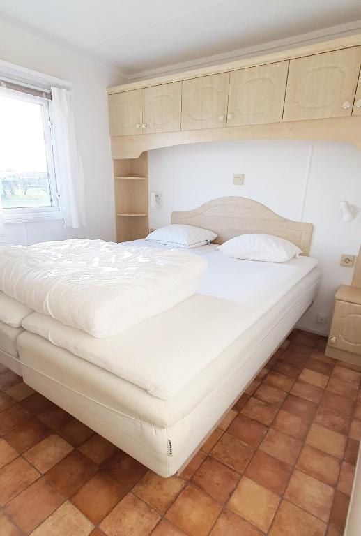 Postel nebo postele na pokoji v ubytování Tobisviks Camping