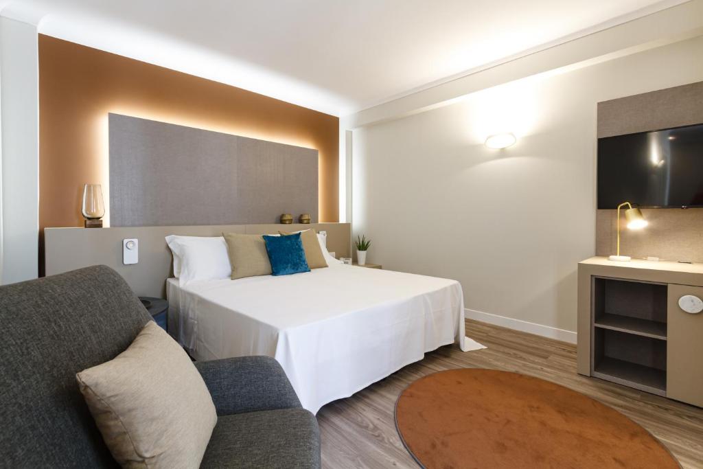 Postel nebo postele na pokoji v ubytování Seawater Hotel Bio & Beauty Spa