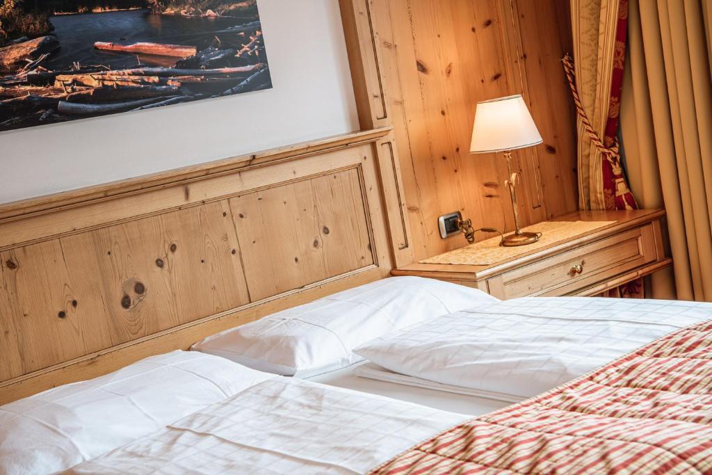 Postel nebo postele na pokoji v ubytování Hotel Scherlin