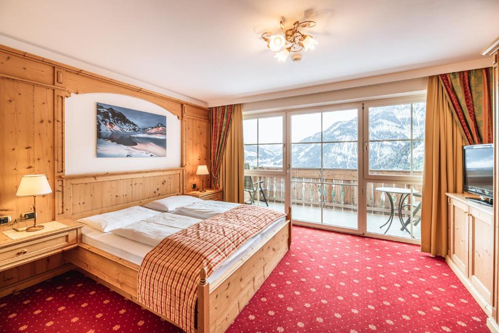 Postel nebo postele na pokoji v ubytování Hotel Scherlin