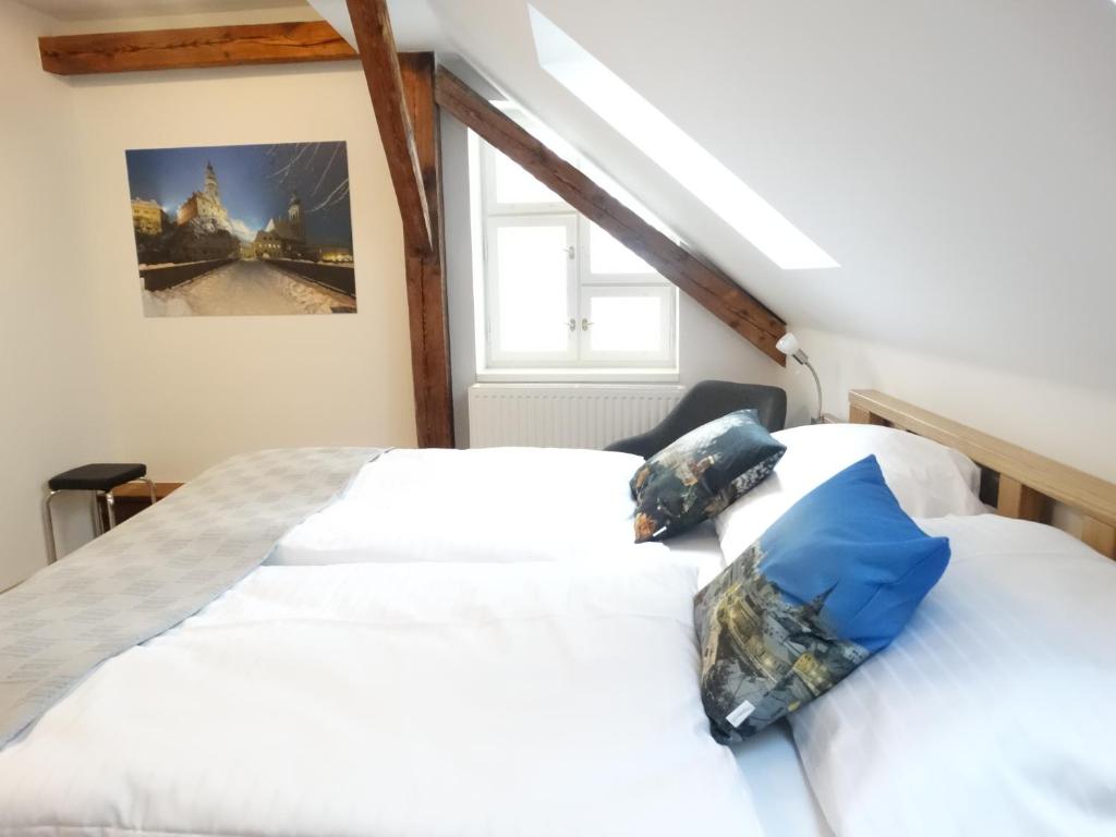 Postel nebo postele na pokoji v ubytování Hotel Garni Villa Areka