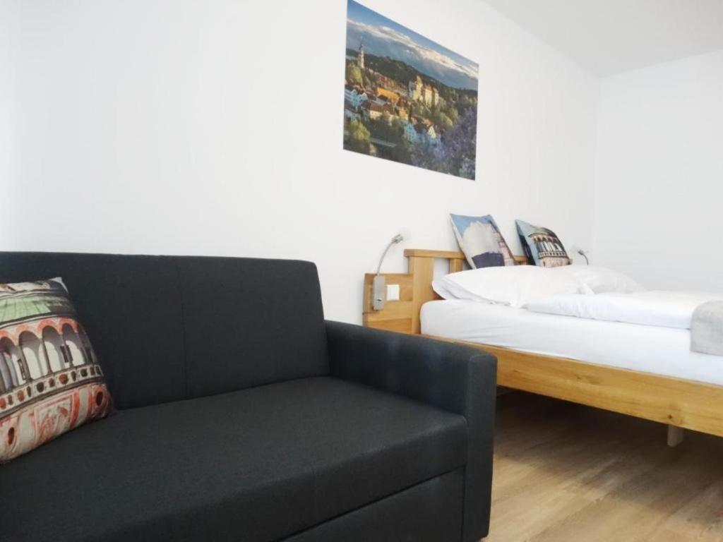Postel nebo postele na pokoji v ubytování Hotel Garni Villa Areka