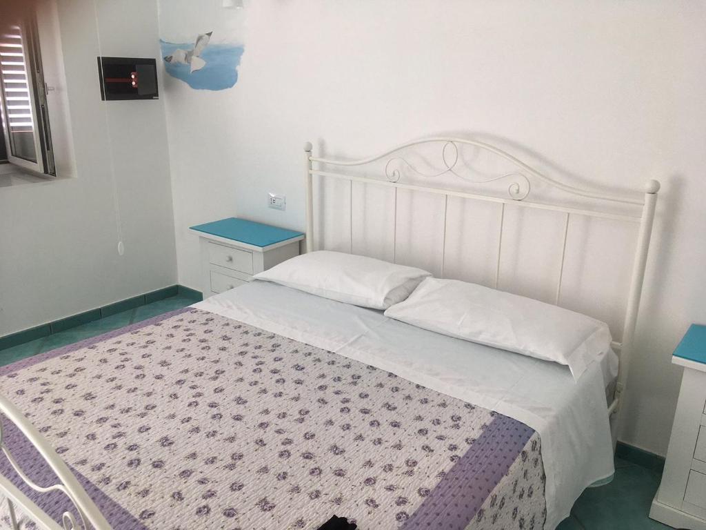Кровать или кровати в номере Da Clotilde
