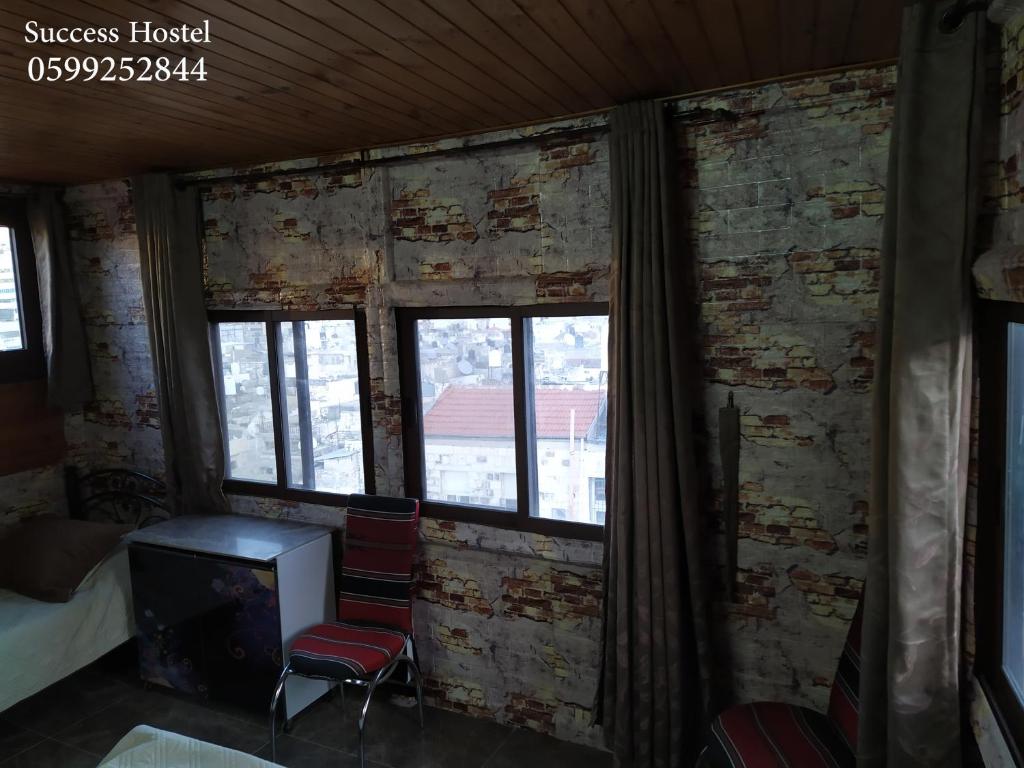 Posezení v ubytování Success Hostel