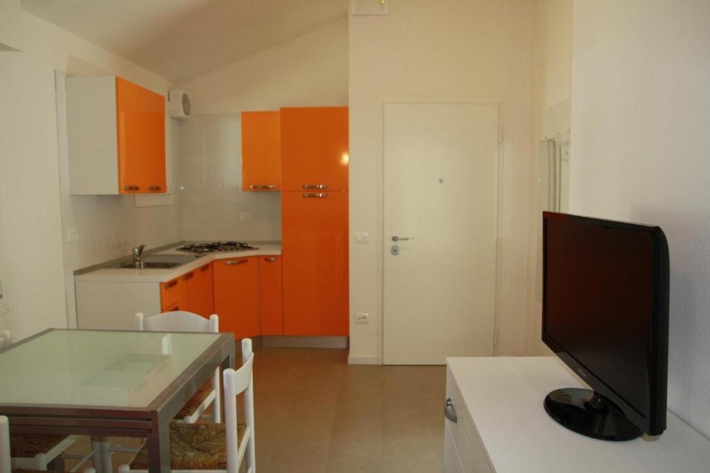 A kitchen or kitchenette at Villaggio Solveig Family Apartments