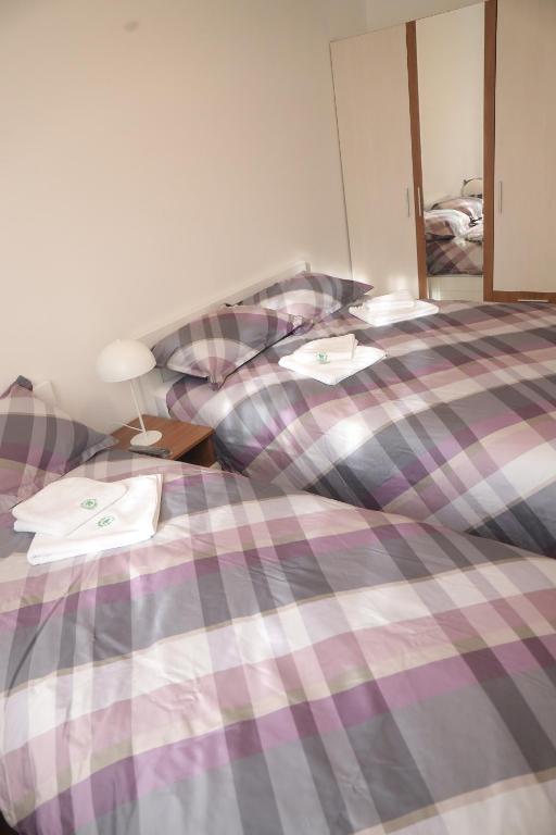 Postel nebo postele na pokoji v ubytování Apartman Lep Pogled Zlatar