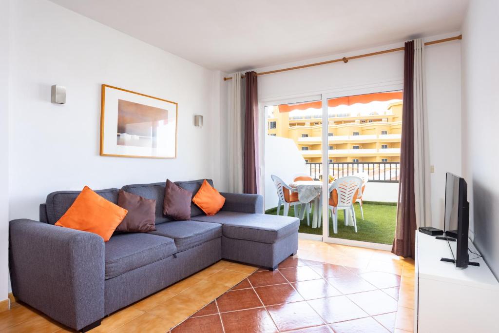 Televízia a/alebo spoločenská miestnosť v ubytovaní Home2Book Paradise Costa Adeje, Pool