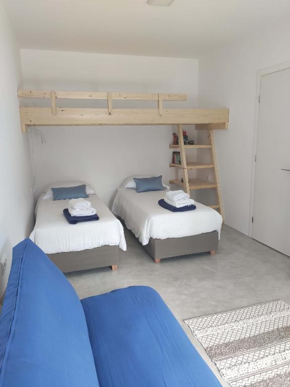 Postel nebo postele na pokoji v ubytování Galini Villas