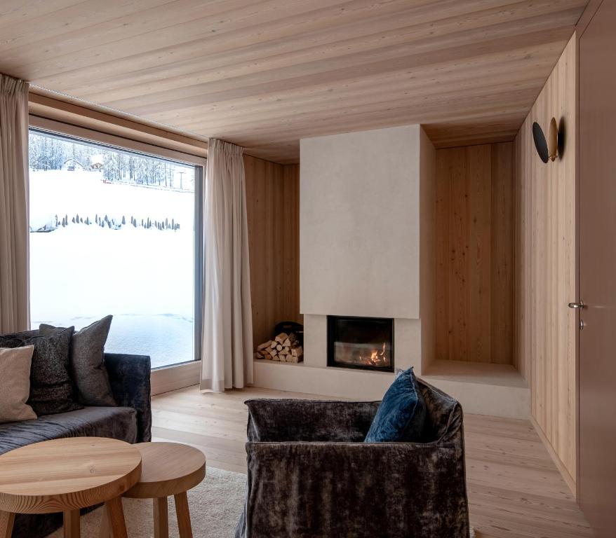 Posezení v ubytování Larix Lodge