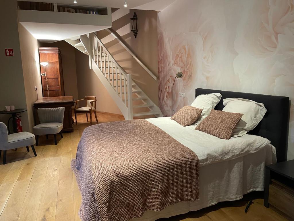 Postel nebo postele na pokoji v ubytování B&B Het Doctershoes