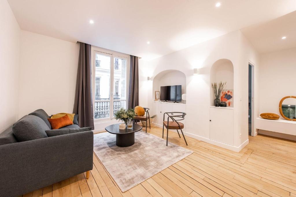 Гостиная зона в Central and renovated Parisian apartment, 6-7 guests