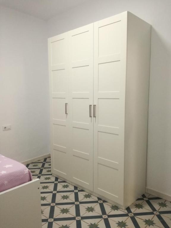 Postel nebo postele na pokoji v ubytování Apartamento Ara