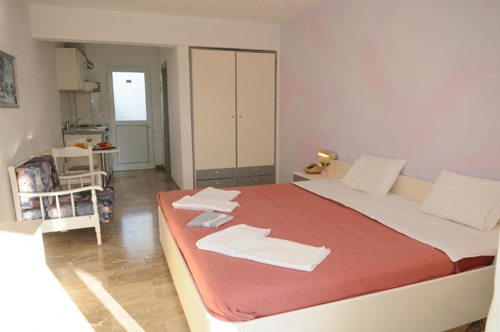 Postel nebo postele na pokoji v ubytování Pegasus Hotel