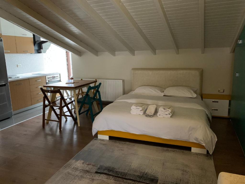 Postel nebo postele na pokoji v ubytování Guest House People
