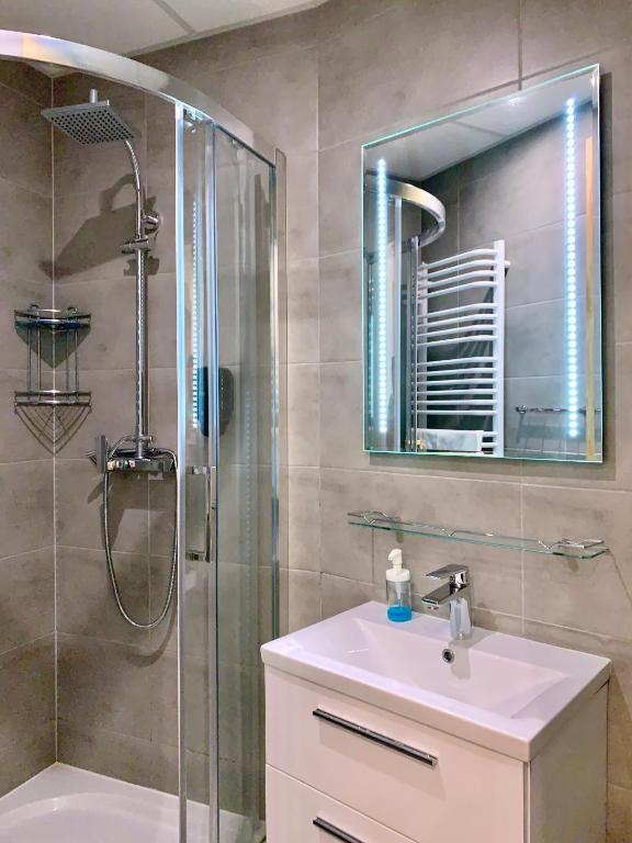 Kúpeľňa v ubytovaní APARTAMENTY KRUPÓWKI 35 (Maria Mąka)