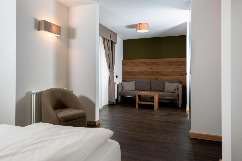 Postel nebo postele na pokoji v ubytování Hotel Valacia