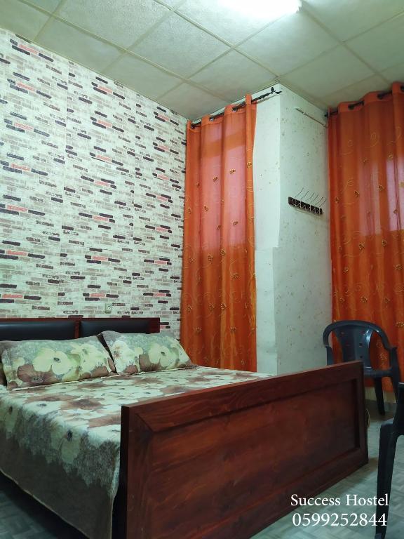 Postel nebo postele na pokoji v ubytování Success Hostel