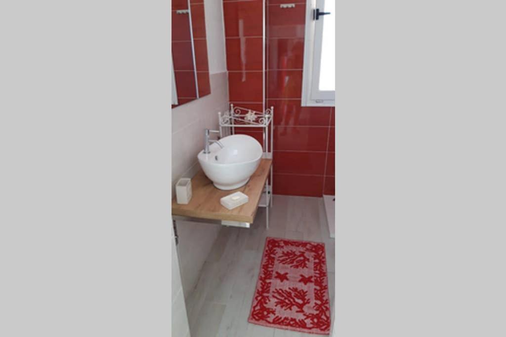 Kúpeľňa v ubytovaní Appartamento corallo