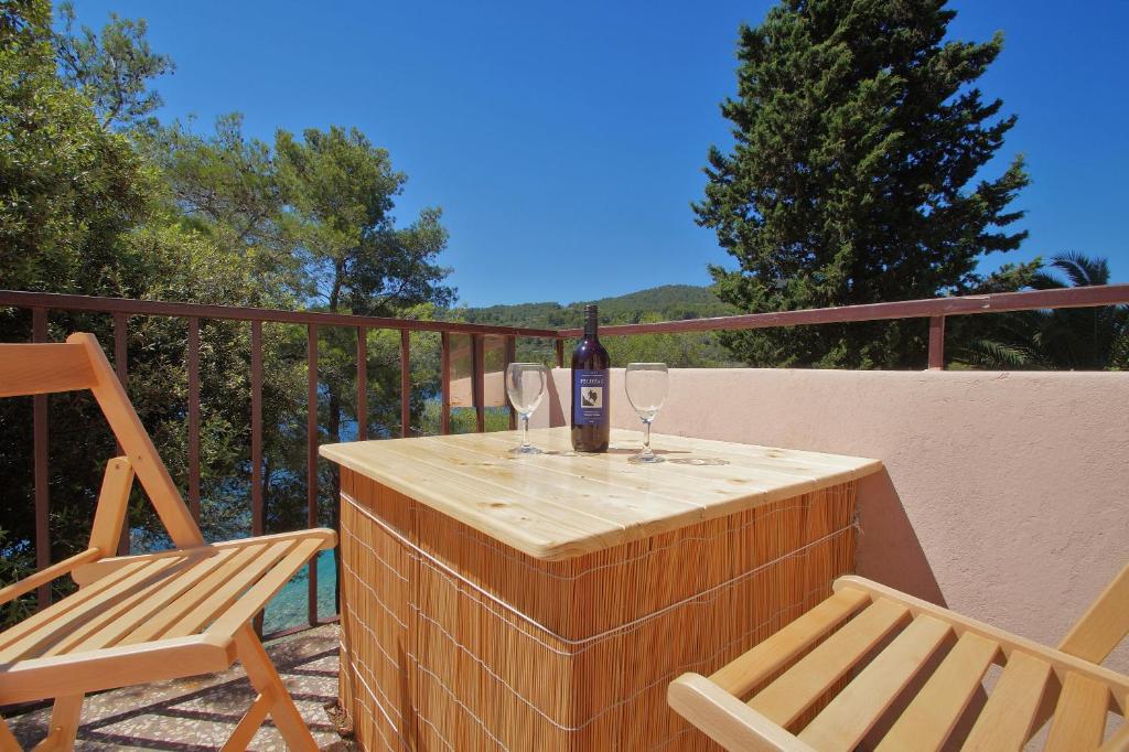 Balkón nebo terasa v ubytování Seafront Apartment Dana