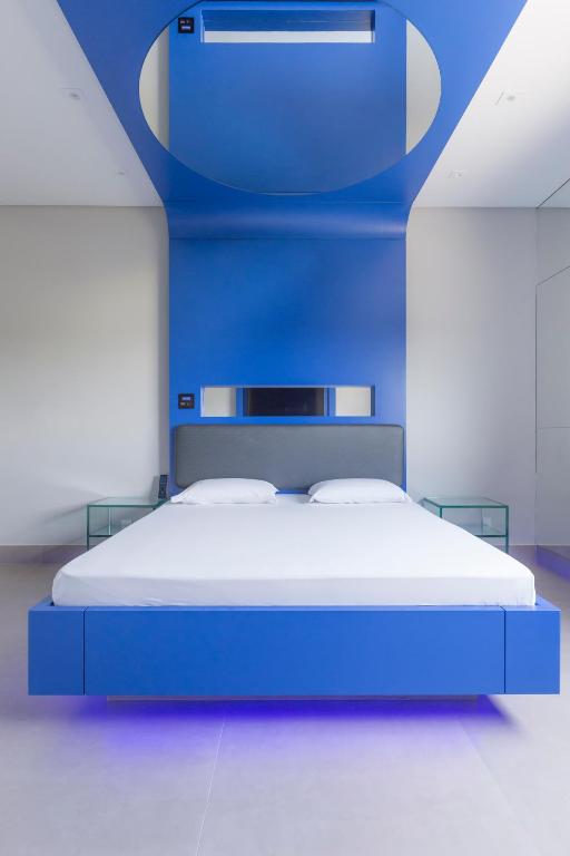 Postel nebo postele na pokoji v ubytování Poeme Motel by Drops