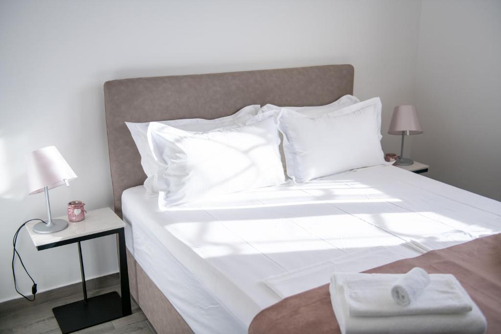 Posteľ alebo postele v izbe v ubytovaní Bella Apartments Zaton